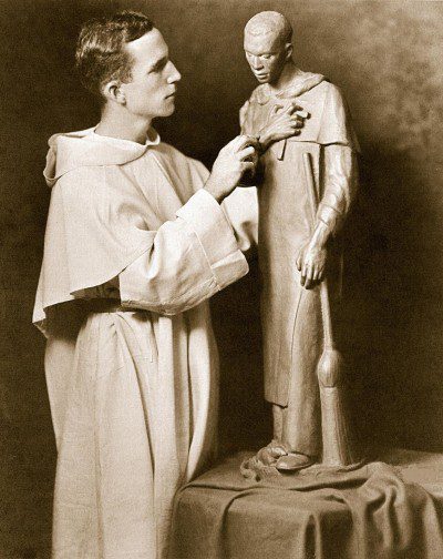 A young Fr. McGlynn, O.P. sculpts "St. Martin de Porres."