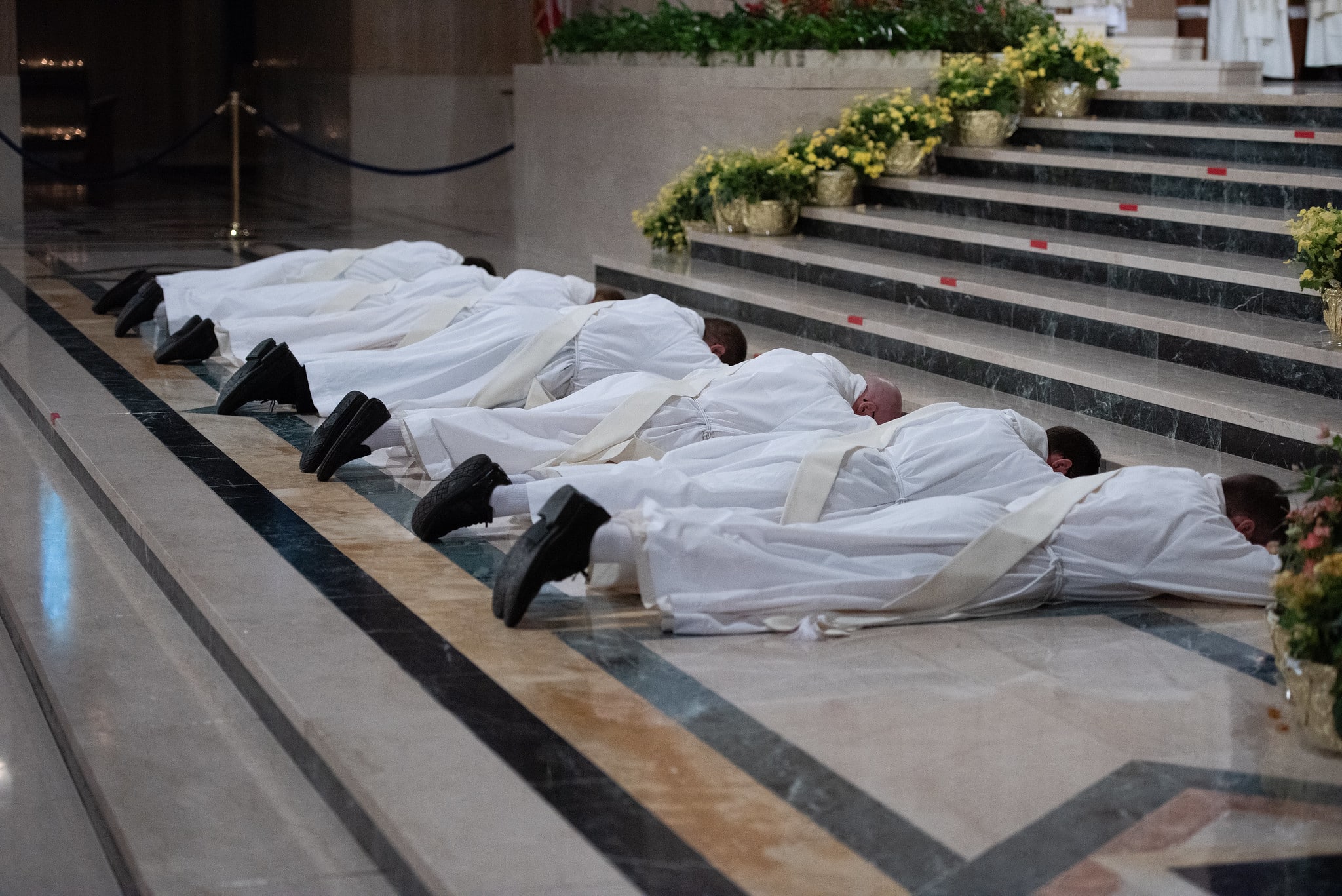 Dominican Friars lying prostrate at ordination